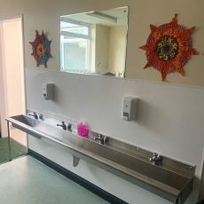 compact wash trough installed in a school